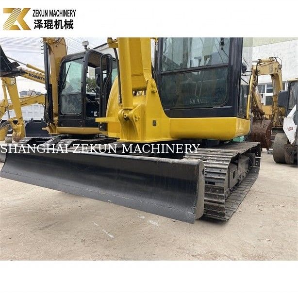 Mini-excavatrice Komatsu PC56-7 avec un poids de fonctionnement de 5 tonnes et un moteur diesel durable