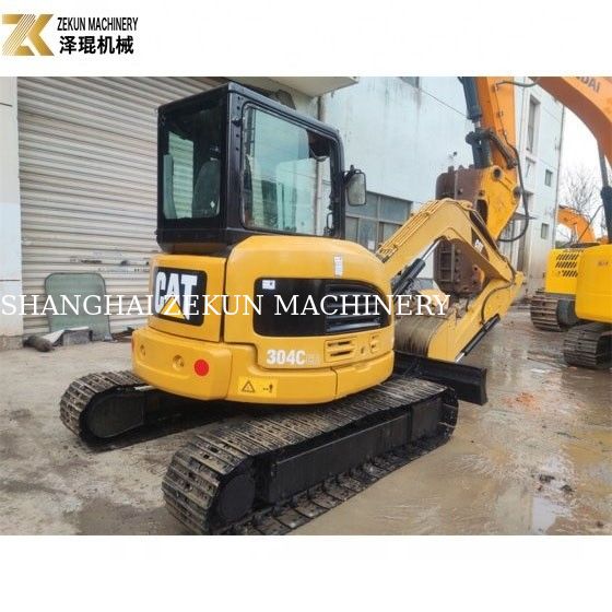 Excavateur CAT 304 de 4 tonnes usagé avec cabine fermée et cylindre hydraulique d'origine