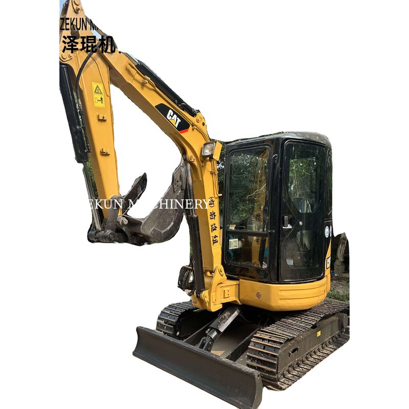 Excavatrice miniature à canne à roulettes Caterpillar Cat 303 utilisée avec un seau de 0,12 M3 en 2020