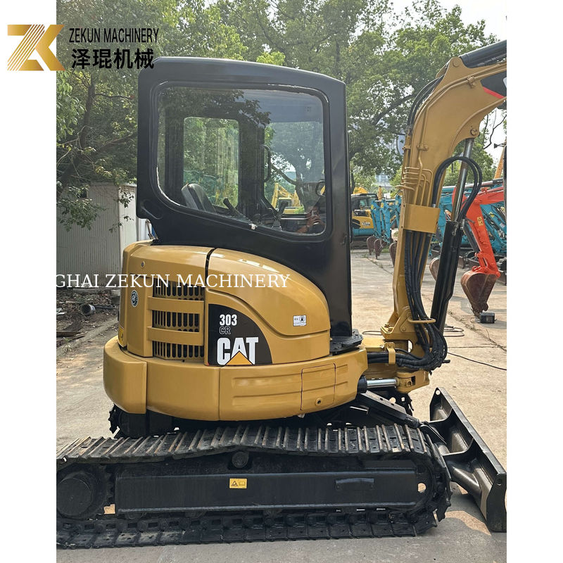 Excavatrice miniature à canne à roulettes Caterpillar Cat 303 utilisée avec un seau de 0,12 M3 en 2020