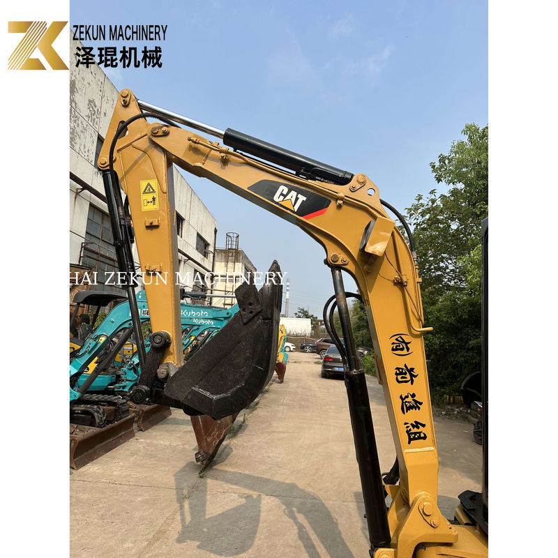 Excavatrice miniature à canne à roulettes Caterpillar Cat 303 utilisée avec un seau de 0,12 M3 en 2020