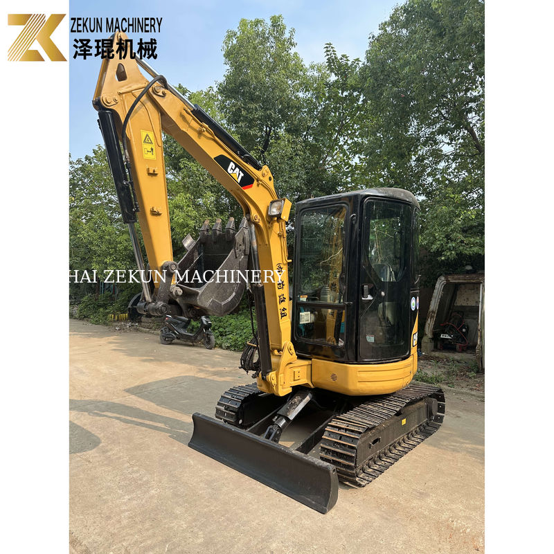 Excavatrice miniature à canne à roulettes Caterpillar Cat 303 utilisée avec un seau de 0,12 M3 en 2020