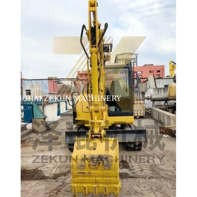 Excavateur Komatsu PC56 d'occasion avec une capacité de seau de 0,2 m3 et 0-2000 heures de travail