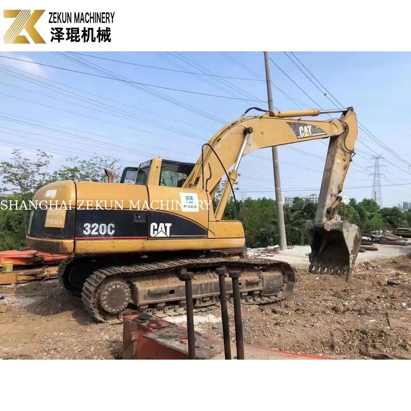 Expérience d'excavation supérieure avec la pelle CAT 320 et sa pompe hydraulique CAT