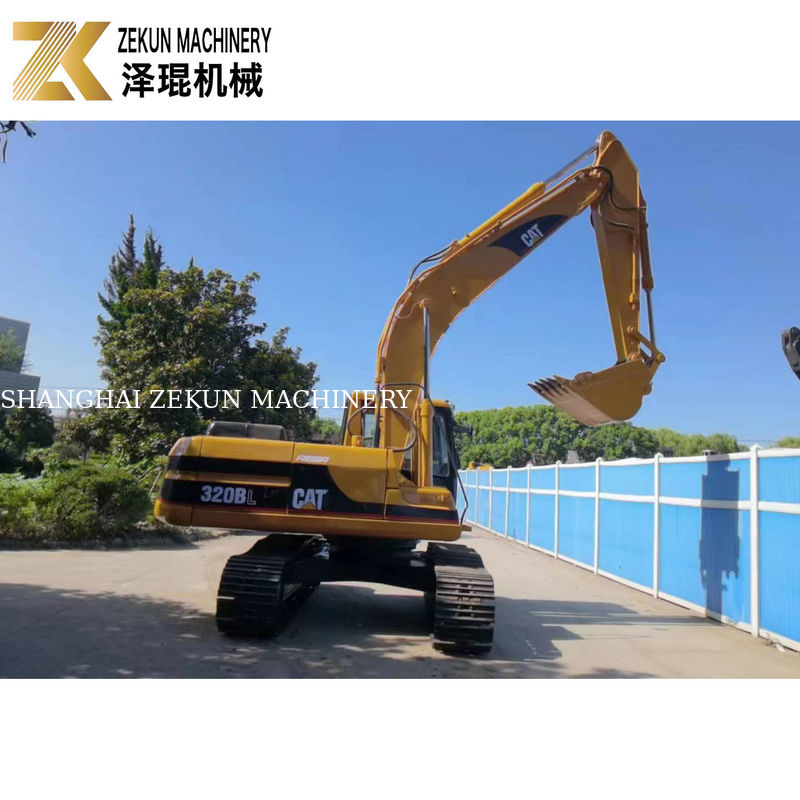 Excavateur Cat 320 BL d'occasion avec une capacité de seau de 0,92 m3 et 2001-4000 heures de travail