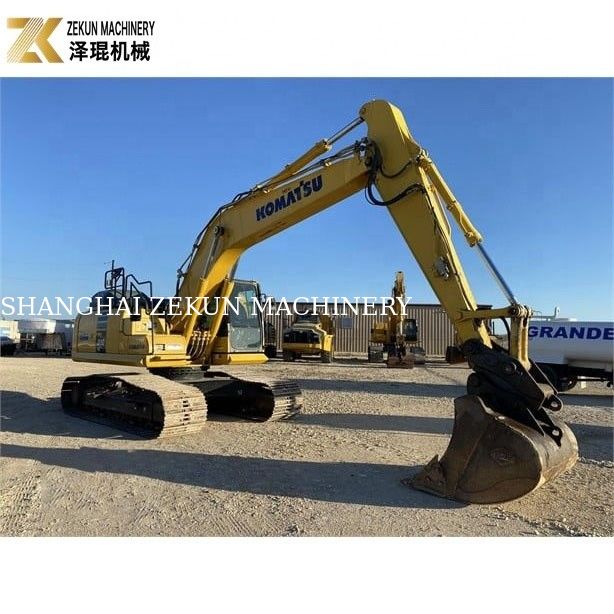 Excavatrice à rouleaux utilisée Komatsu PC 210-LC 7 avec plaquettes en caoutchouc 20900 KG