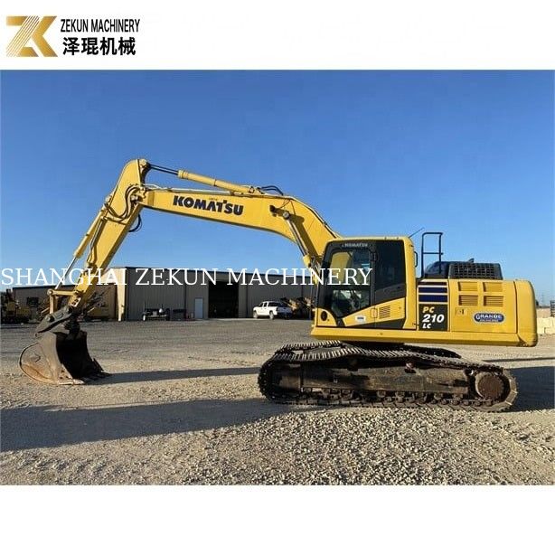 Excavatrice à rouleaux utilisée Komatsu PC 210-LC 7 avec plaquettes en caoutchouc 20900 KG