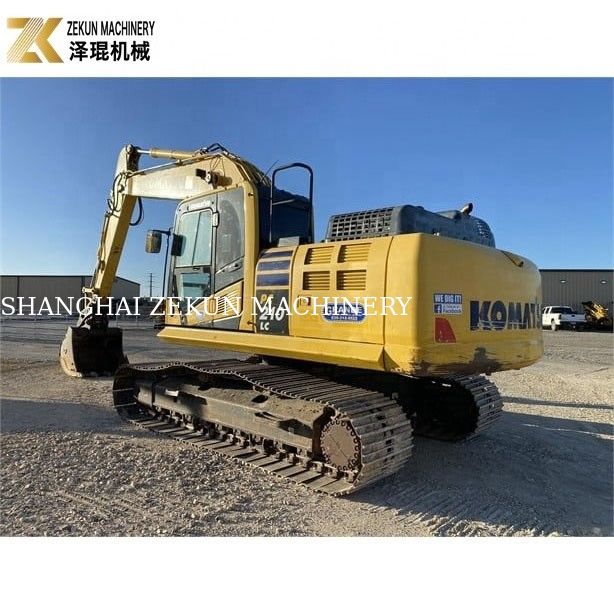 Excavatrice à rouleaux utilisée Komatsu PC 210-LC 7 avec plaquettes en caoutchouc 20900 KG