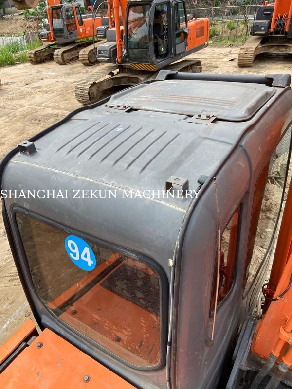 Excavatrice Hitachi ZX200-3G d'occasion avec 11050 heures, longueur de bras 2,94 m, longueur de flèche 5,7 m